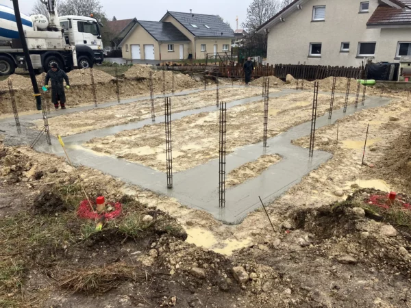 temps construction maison fondations coulees